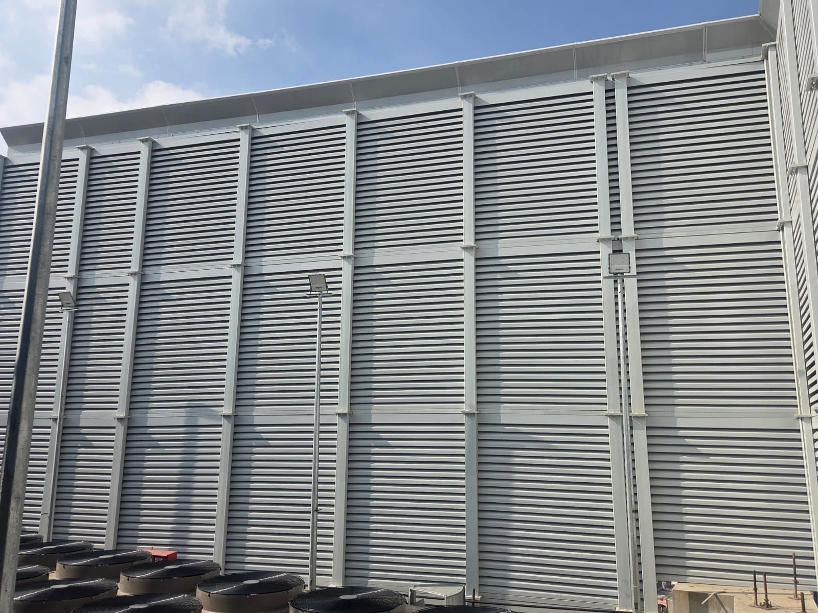 Single face of the acoustic louver enclosure in Bangalore showing full height and structural framing.